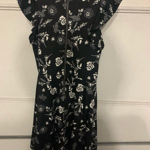 Black floral dress. Zips in the back. Worn once